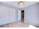 Cozy bedroom with wood floors and a closet at 433 Royal Bridge Dr, Las Vegas, NV 89178