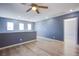 Bonus room with laminate floors, recessed lighting, and lots of natural light at 433 Royal Bridge Dr, Las Vegas, NV 89178