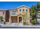 Charming two-story home featuring a balcony, two-car garage, and well-maintained landscaping at 433 Royal Bridge Dr, Las Vegas, NV 89178