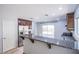 Well-lit kitchen with granite counters, stainless steel appliances, and outdoor access at 433 Royal Bridge Dr, Las Vegas, NV 89178