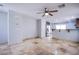 Open-concept living space seamlessly connects to kitchen with granite countertops and stainless steel appliances at 433 Royal Bridge Dr, Las Vegas, NV 89178