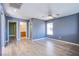 Spacious main bedroom with wood-look floors and ensuite bathroom access at 433 Royal Bridge Dr, Las Vegas, NV 89178