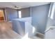 Bright stairway landing showcases an open floorplan and neutral tones at 433 Royal Bridge Dr, Las Vegas, NV 89178