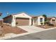 Well-maintained single-story home with desert landscaping and a two-car garage at 4410 S Gressa St, Pahrump, NV 89061