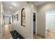 Inviting hallway featuring decorative niches, neutral paint and tile flooring at 4410 S Gressa St, Pahrump, NV 89061
