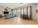 Open concept living room featuring tile floors, recessed lighting, and modern decor at 4410 S Gressa St, Pahrump, NV 89061