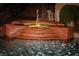 Inviting backyard with stone fountain cascading into a shimmering pool, perfect for relaxing evenings at 4554 Blue Mesa Way, Las Vegas, NV 89129