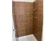 Bathroom shower with brown tile at 4564 Dennis Way, Las Vegas, NV 89121