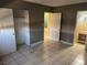 Spacious bedroom featuring tiled floors, closet, and ensuite bathroom at 4778 Beadle St, Las Vegas, NV 89122