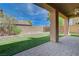 Spacious backyard featuring manicured artificial grass and brick perimeter walls at 484 Merseyside Dr, Las Vegas, NV 89178