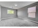 Bedroom with two windows for ample natural light at 484 Merseyside Dr, Las Vegas, NV 89178
