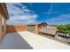 This outdoor deck offers views of the neighborhood and surrounding landscape, complemented by a clear blue sky at 484 Merseyside Dr, Las Vegas, NV 89178