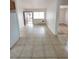 The living room boasts ample tile flooring, natural light, and seamless access to the rest of the unit at 4955 Jeffreys St # 403, Las Vegas, NV 89119