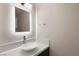 Modern bathroom with illuminated mirror, chrome faucet, and vessel sink at 5009 Elm Grove Dr, Las Vegas, NV 89130
