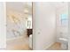 Bathroom featuring modern vanity and decorative accent wall at 5009 Elm Grove Dr, Las Vegas, NV 89130