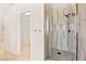 Bathroom featuring glass shower enclosure and open walk-in closet at 5009 Elm Grove Dr, Las Vegas, NV 89130