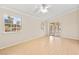 Bedroom with large windows and sliding glass door to the outside at 5009 Elm Grove Dr, Las Vegas, NV 89130