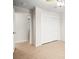 Bedroom featuring wood-look tile, neutral paint, closet with sliding doors, and ceiling fan at 5009 Elm Grove Dr, Las Vegas, NV 89130