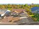 Charming single-story home with a well-manicured front yard, mature landscaping, and a two-car garage at 5009 Elm Grove Dr, Las Vegas, NV 89130