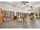 Inviting library with floor-to-ceiling bookshelves and tables for quiet reading at 5009 Elm Grove Dr, Las Vegas, NV 89130