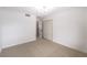 Bedroom with neutral carpet, closet, and access door to another room at 516 Donner St, Las Vegas, NV 89107