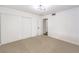 Bedroom featuring neutral carpet, a closet, and a contemporary light fixture at 516 Donner St, Las Vegas, NV 89107