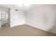 Bedroom showing neutral carpet and an access door to another room at 516 Donner St, Las Vegas, NV 89107