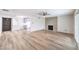 Spacious living room features modern flooring, a sleek fireplace, and ample natural light from sliding glass doors at 516 Donner St, Las Vegas, NV 89107