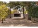 Large backyard featuring mature trees, providing a serene and private outdoor space at 5260 Styers St, North Las Vegas, NV 89031