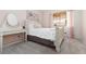 Cozy bedroom with carpet, neutral-colored walls, and bright natural light at 5260 Styers St, North Las Vegas, NV 89031