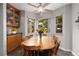 Cozy breakfast nook with beautiful view, built-in cabinets, and lots of natural light at 5260 Styers St, North Las Vegas, NV 89031
