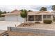 Charming single-story home with a well-maintained front yard and a two-car garage at 5260 Styers St, North Las Vegas, NV 89031
