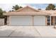 Spacious two-car garage with a wide driveway for extra parking at 5260 Styers St, North Las Vegas, NV 89031