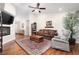Inviting living room with hardwood floors, fireplace, and cozy seating area at 5260 Styers St, North Las Vegas, NV 89031