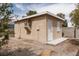 Exterior view of a detached shed in the backyard, offering extra storage or workspace at 5260 Styers St, North Las Vegas, NV 89031