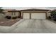 Charming single-story home with two-car garage and well-maintained landscaping at 5318 Rio Eldorado Ct, North Las Vegas, NV 89031