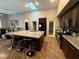 Spacious kitchen with an island, granite countertops, and modern appliances at 5318 Rio Eldorado Ct, North Las Vegas, NV 89031