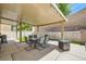 Backyard featuring a covered patio with dining set, and a fire pit at 5409 Cruz Crest Ct, North Las Vegas, NV 89081