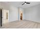 A bedroom featuring sleek floors and multiple entryways to other rooms at 5737 Heather Breeze Ct, Las Vegas, NV 89141