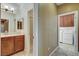 Hallway features a bathroom with a shower and a laundry room with a washer and dryer at 5949 Casa Coronado Ave, Las Vegas, NV 89131