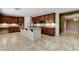 Gourmet kitchen features granite counters, stainless appliances, and large central island with ample counter space at 5949 Casa Coronado Ave, Las Vegas, NV 89131
