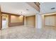 Open-concept living room with tile floors and a view of the entryway for a seamless transition at 5949 Casa Coronado Ave, Las Vegas, NV 89131