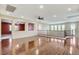 Open loft area with hardwood floors, recessed lighting, and a view into adjacent rooms at 5949 Casa Coronado Ave, Las Vegas, NV 89131