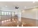 Spacious loft featuring hardwood floors, recessed lights, and a ceiling fan at 5949 Casa Coronado Ave, Las Vegas, NV 89131