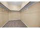 Walk-in closet with shelving and carpeted floor at 6088 Gulf Island Ave, Las Vegas, NV 89156