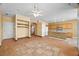 Open floor plan with spacious living room. Laminate flooring, tile flooring, and open kitchen at 6088 Gulf Island Ave, Las Vegas, NV 89156