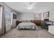 Bright bedroom showcasing a workspace and window views at 6141 Annville Ct, North Las Vegas, NV 89081