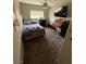 Cozy bedroom featuring neutral tones, a ceiling fan, and carpet flooring at 6141 Annville Ct, North Las Vegas, NV 89081