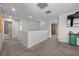 Upstairs hallway featuring neutral paint, carpet floors, and a view of the rest of the home at 6141 Annville Ct, North Las Vegas, NV 89081