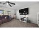 Cozy living room with carpet flooring and bright natural light at 6141 Annville Ct, North Las Vegas, NV 89081